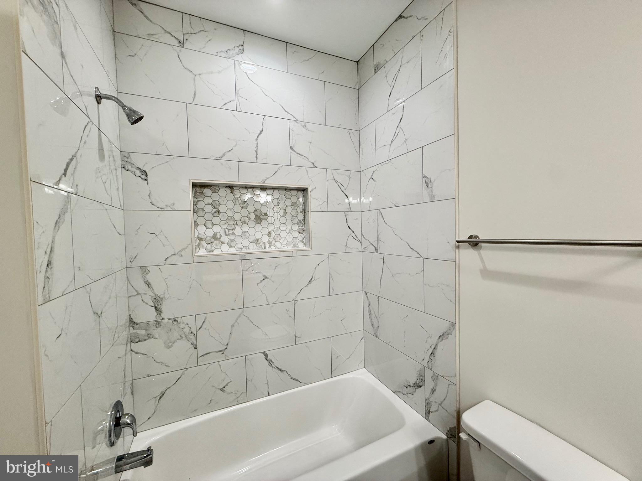 130 Poplar Lane Colonial Beach, VA 22443 - Photo 35 of 74 a bathroom with a bathtub and shower