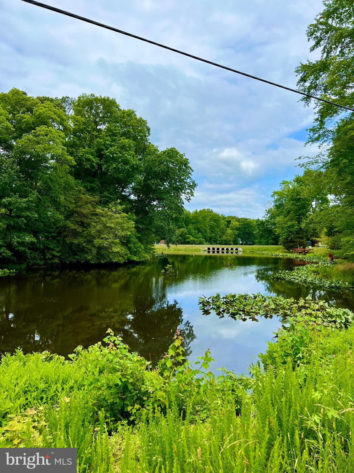 130 Poplar Lane Colonial Beach, VA 22443 - Photo 73 of 74 a view of a lake with a house in the background