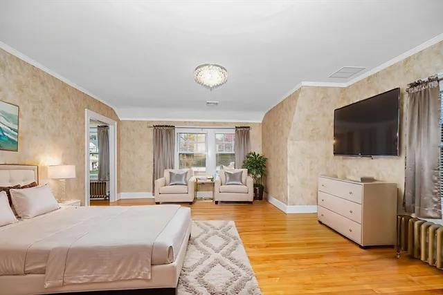 a bedroom with a bed and furniture