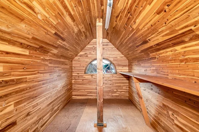 a bathroom with a bathtub and a sink