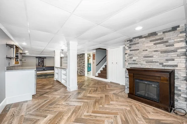 a room with pool table and flat screen tv