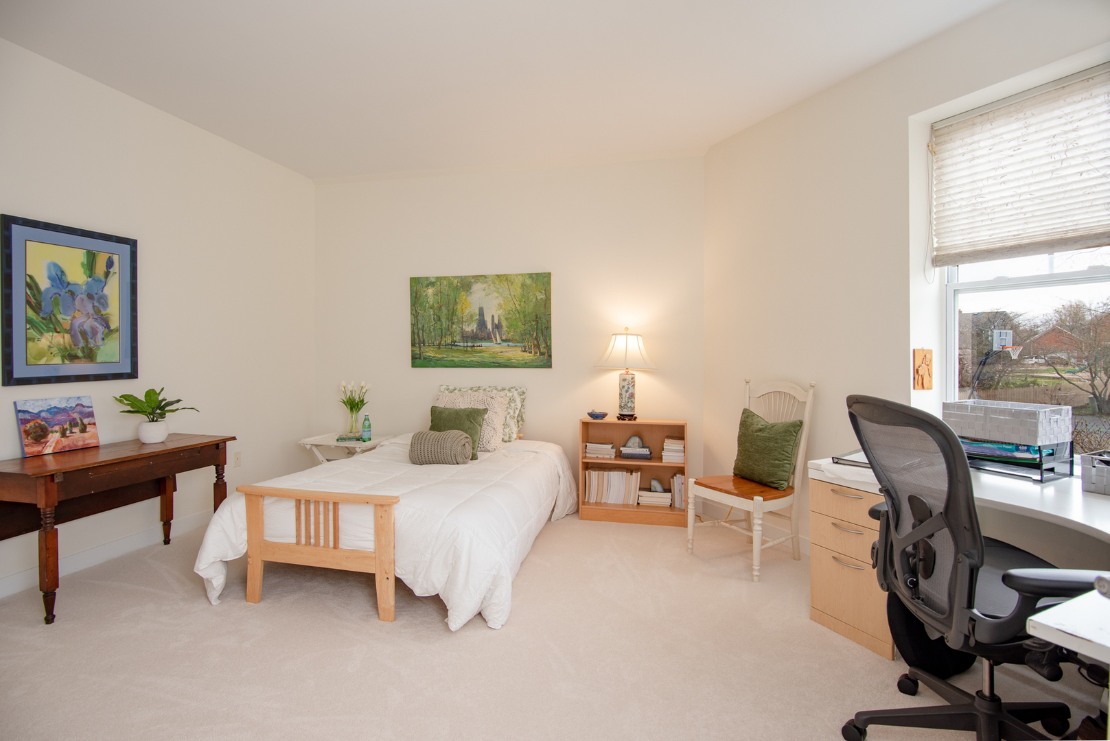 977 Harris Road, Unit 14 Grayslake, IL 60030 - Photo 17 of 21 a bedroom with a bed a desk and chair next to a window