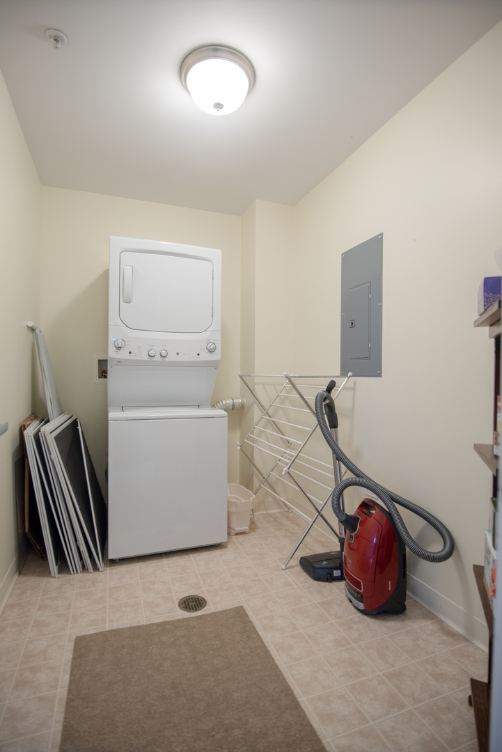 977 Harris Road, Unit 14 Grayslake, IL 60030 - Photo 20 of 21 a room with a washer and dryer