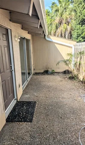 a view of a door and a window