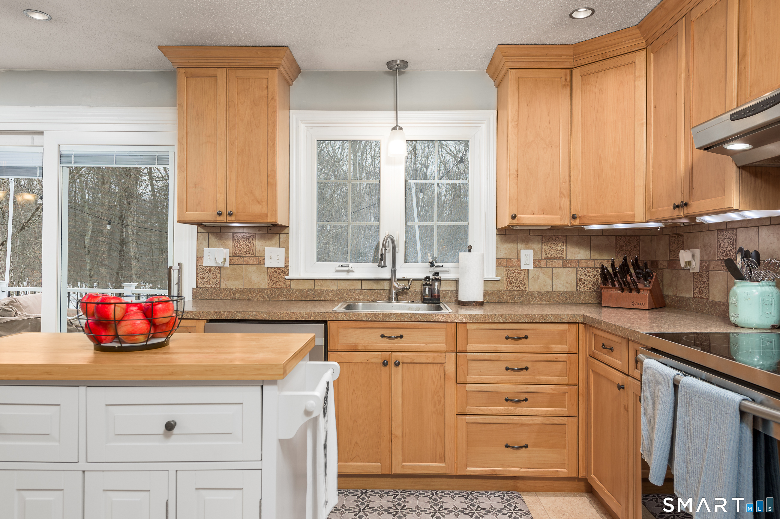 33 Northam Road Hebron, CT 06231 - Photo 9 of 36 a kitchen with stainless steel appliances a sink stove and window