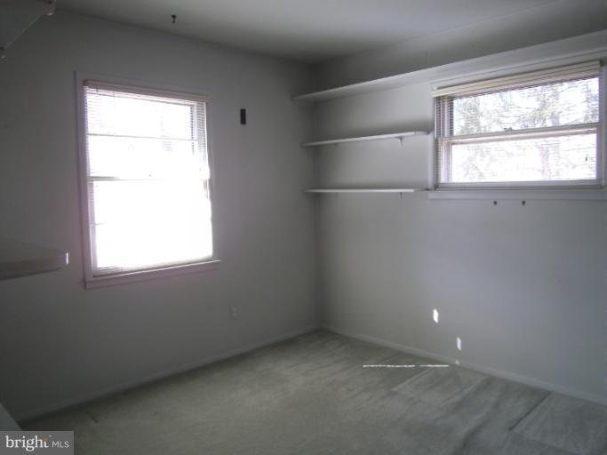 7620 Webbwood Court Springfield, VA 22151 - Photo 4 of 18 an empty room with a window