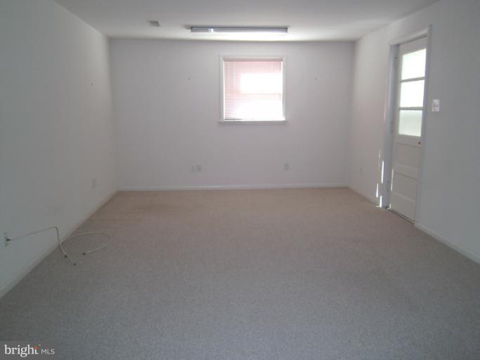 7620 Webbwood Court Springfield, VA 22151 - Photo 5 of 18 an empty room with a window