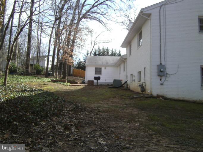 7620 Webbwood Court Springfield, VA 22151 - Photo 10 of 18 a view of a house with a yard
