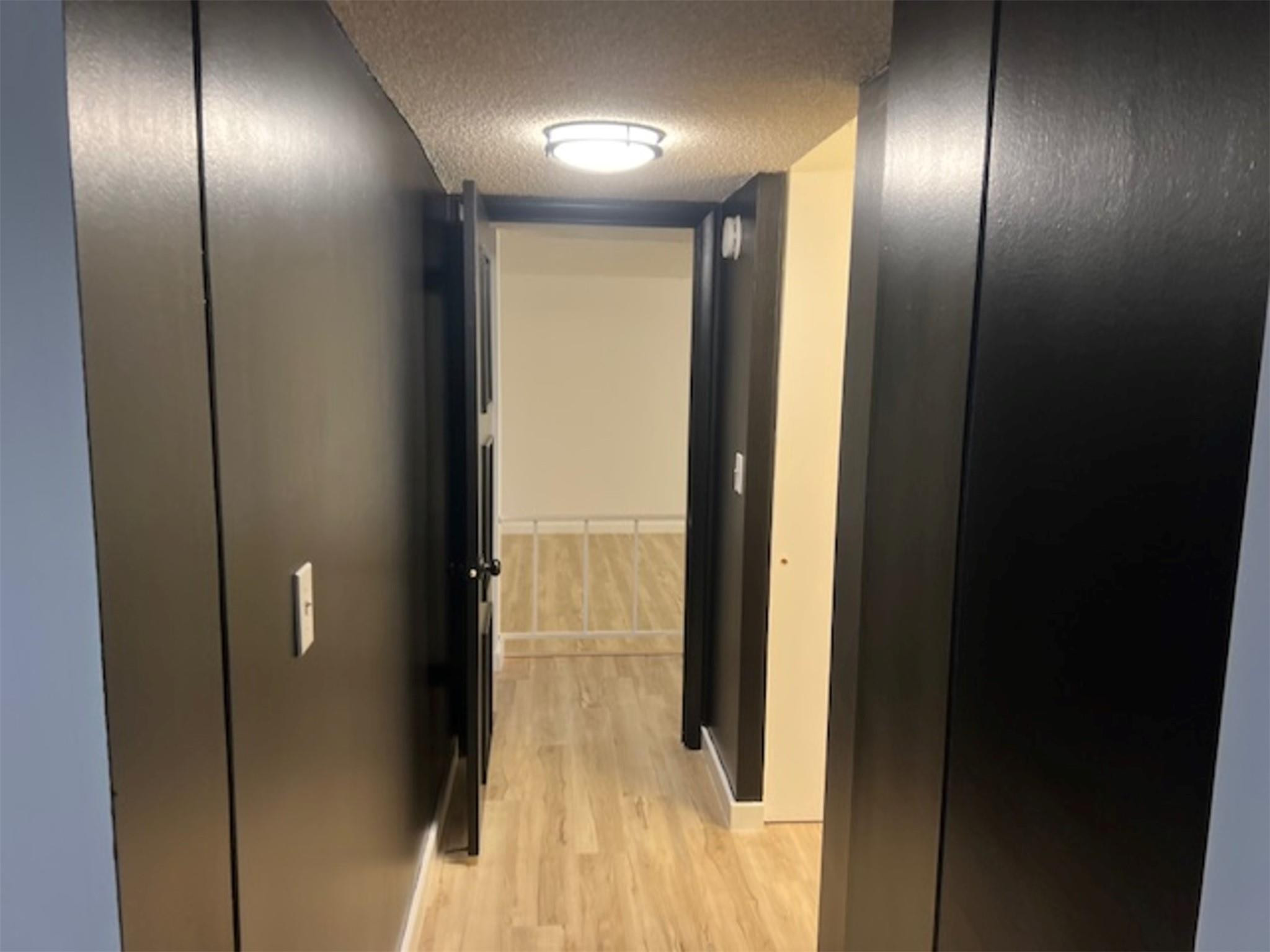 3720 Inverrary Drive, Unit 1T Lauderhill, FL 33319 - Photo 11 of 36 a view of a hallway
