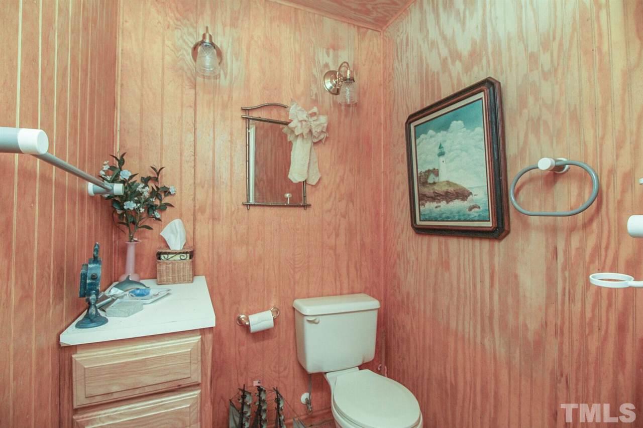 136 Bayleaf Drive Raleigh, NC 27615 - Photo 20 of 23 Great for changing and having your own bathroom! No need to go inside and get the floors wet.