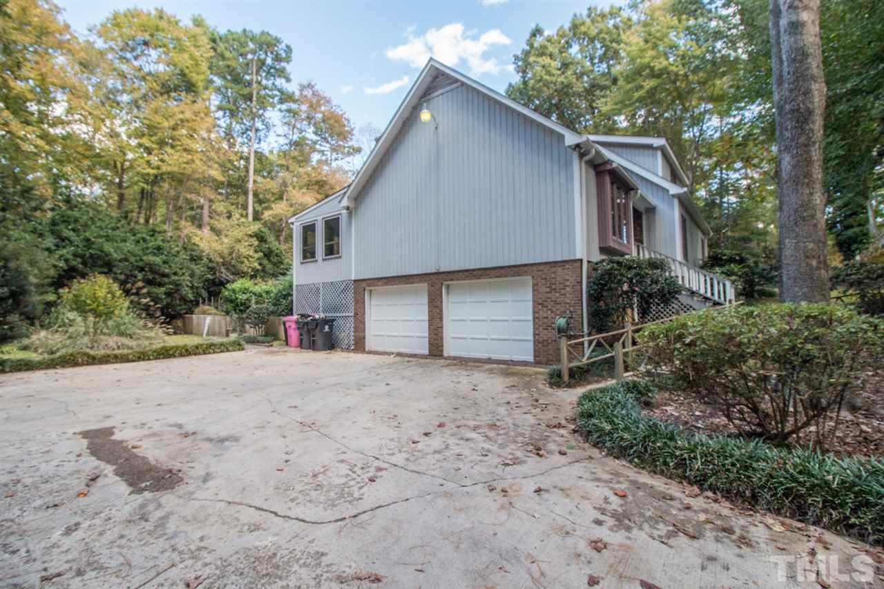 136 Bayleaf Drive Raleigh, NC 27615 - Photo 22 of 23 2 Car garage with Huge parking pad