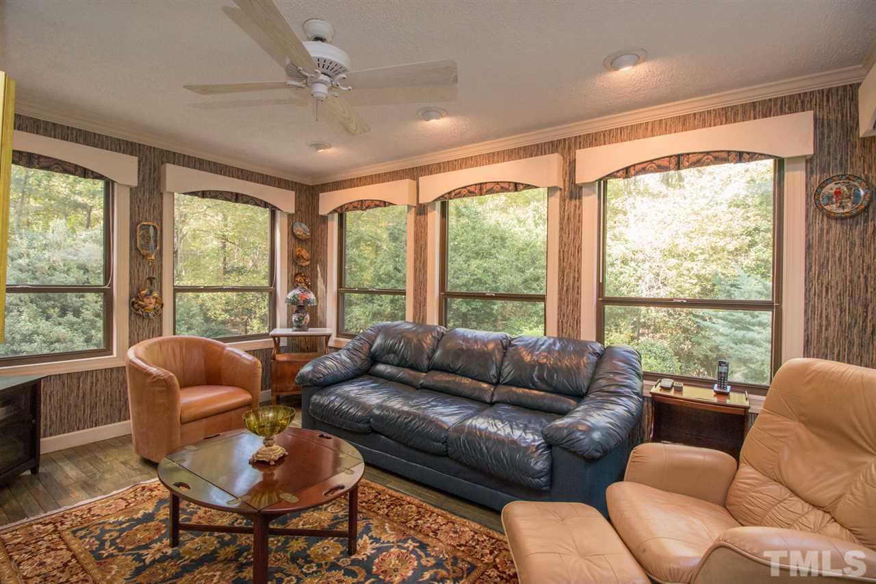 136 Bayleaf Drive Raleigh, NC 27615 - Photo 7 of 23 Spacious Sun Room with a Pool view