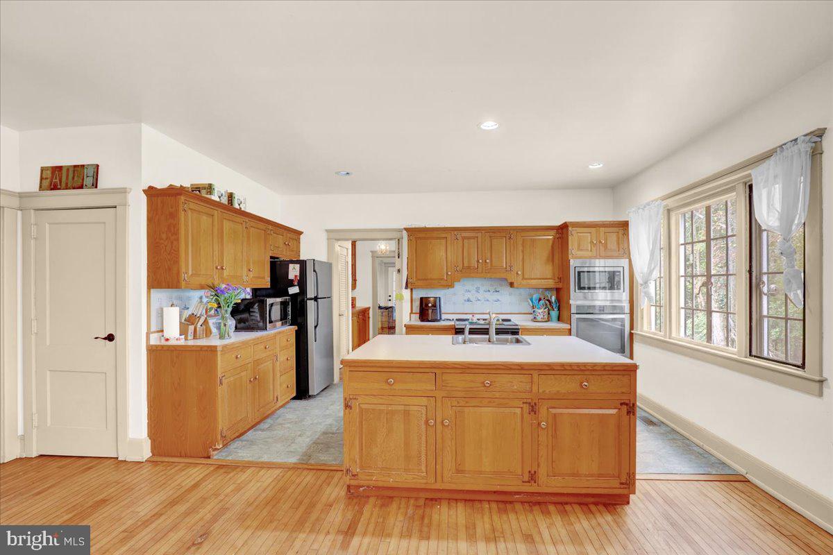 22 Ridge Road Ringtown, PA 17967 - Photo 19 of 46 a room with a bed and a large window