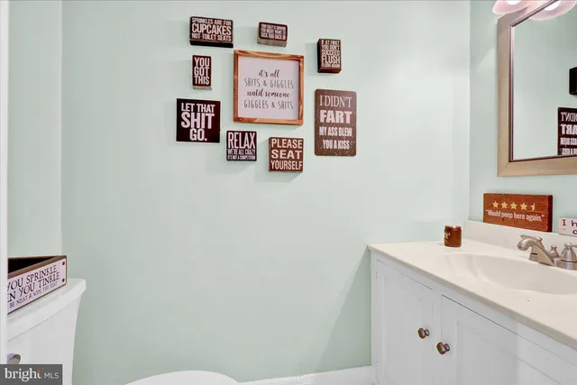 a bathroom with a sink and a toilet
