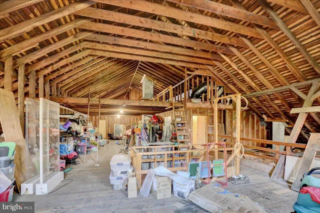 a view of a big room with wooden shelves