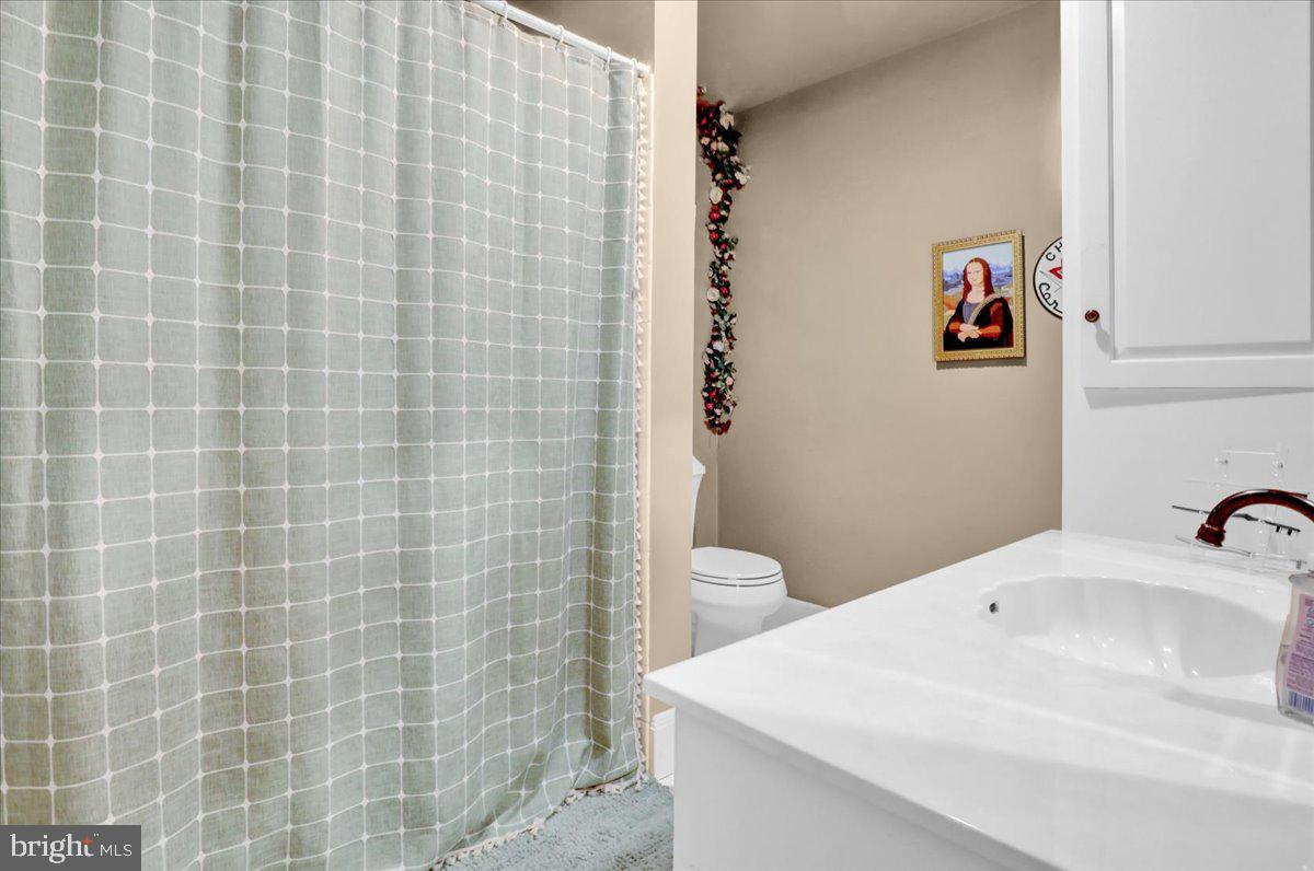 22 Ridge Road Ringtown, PA 17967 - Photo 31 of 46 a bathroom with a sink a toilet and shower