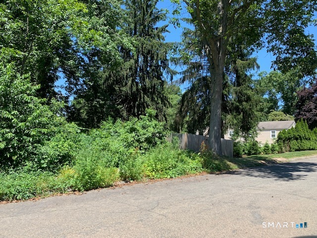 148 Kennedy Drive Orange, CT 06477 - Photo 2 of 13 a view of a garden