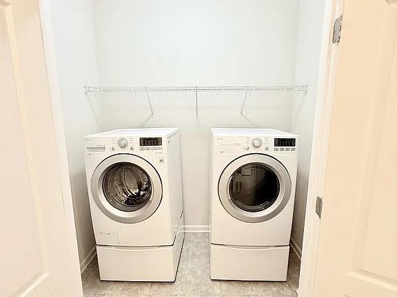 2070 Callaway Court Atlanta, GA 30318 - Photo 12 of 30 a utility room with dryer and washer