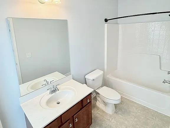 2070 Callaway Court Atlanta, GA 30318 - Photo 21 of 30 a bathroom with a sink toilet and shower