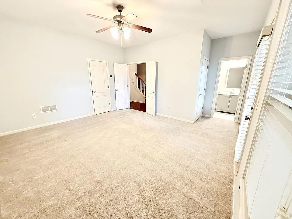 2070 Callaway Court Atlanta, GA 30318 - Photo 22 of 30 a view of a big room with carpet