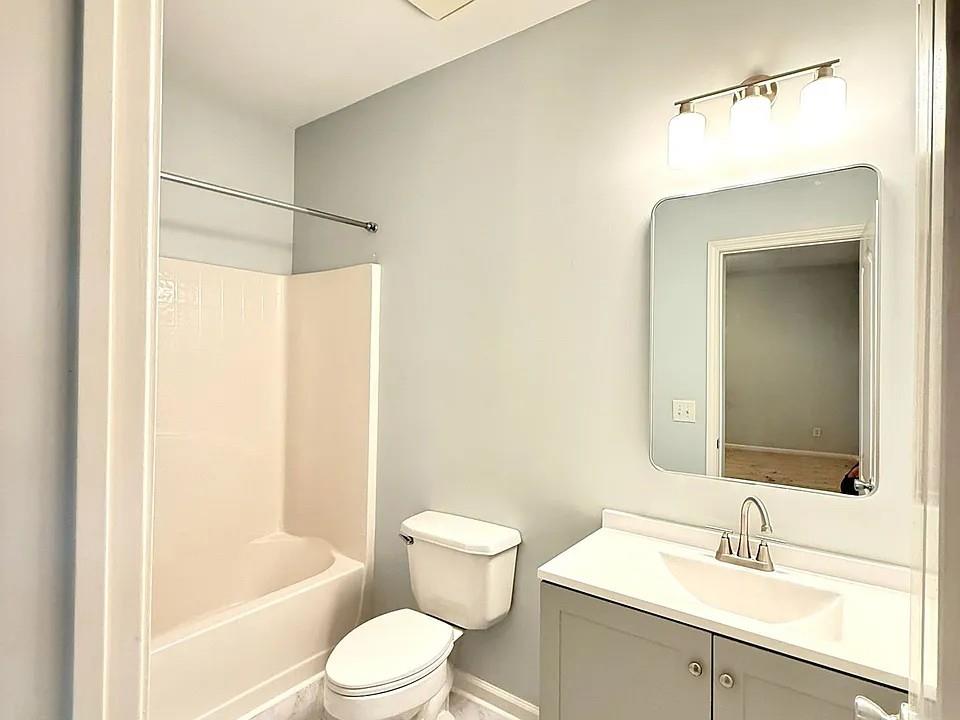 2070 Callaway Court Atlanta, GA 30318 - Photo 25 of 30 a bathroom with a sink toilet and shower