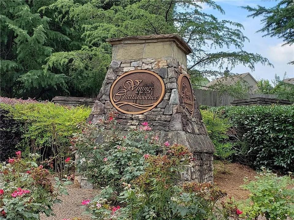 2070 Callaway Court Atlanta, GA 30318 - Photo 27 of 30 a aerial view of a house with a yard and garden