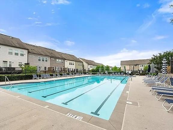 2070 Callaway Court Atlanta, GA 30318 - Photo 28 of 30 a view of swimming pool with outdoor seating and city view