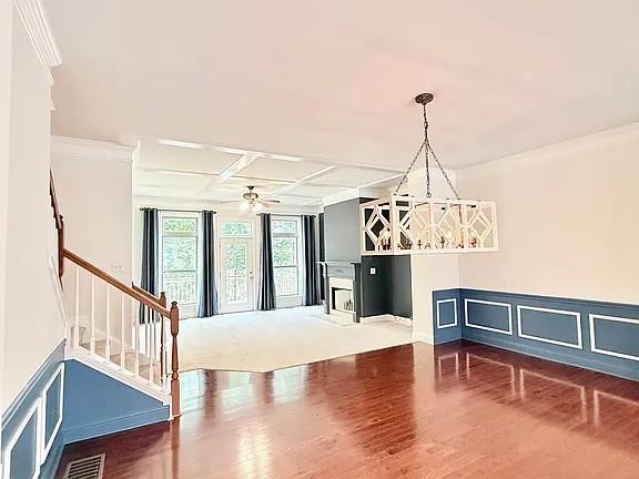 2070 Callaway Court Atlanta, GA 30318 - Photo 6 of 30 a view of a dining room with furniture wooden floor and chandelier
