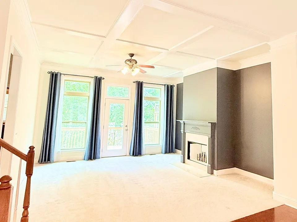 2070 Callaway Court Atlanta, GA 30318 - Photo 7 of 30 a large bedroom with a large bed and a large window