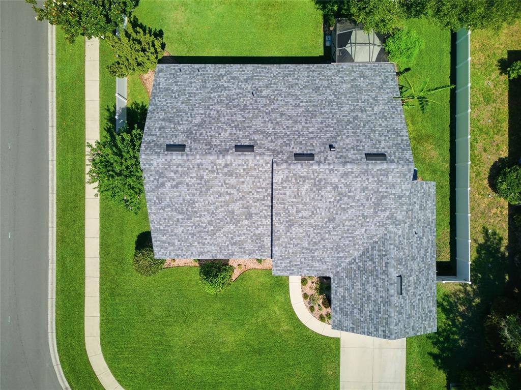5010 Treasure Cay Road Tavares, FL 32778 - Photo 24 of 32 a bird view of a brick house