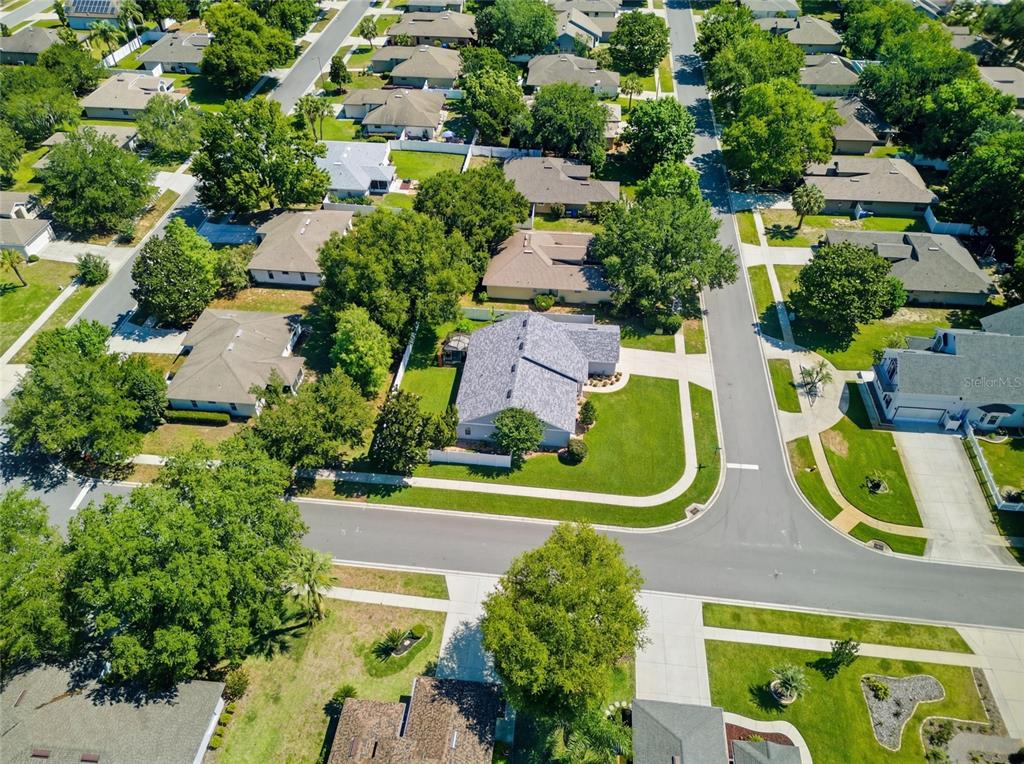5010 Treasure Cay Road Tavares, FL 32778 - Photo 31 of 32 an aerial view of residential house with outdoor space and swimming pool
