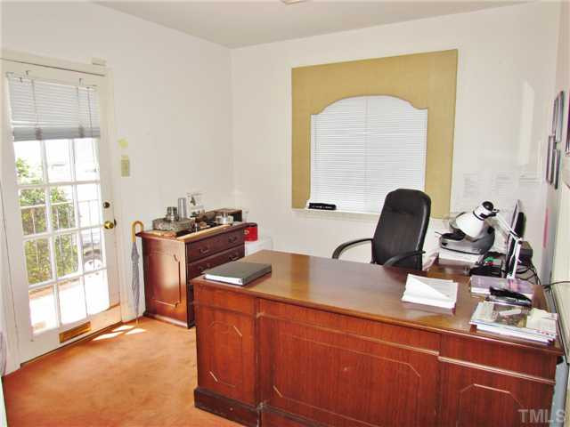 16 Horne Street Raleigh, NC 27607 - Photo 2 of 6 a work room with furniture and a window