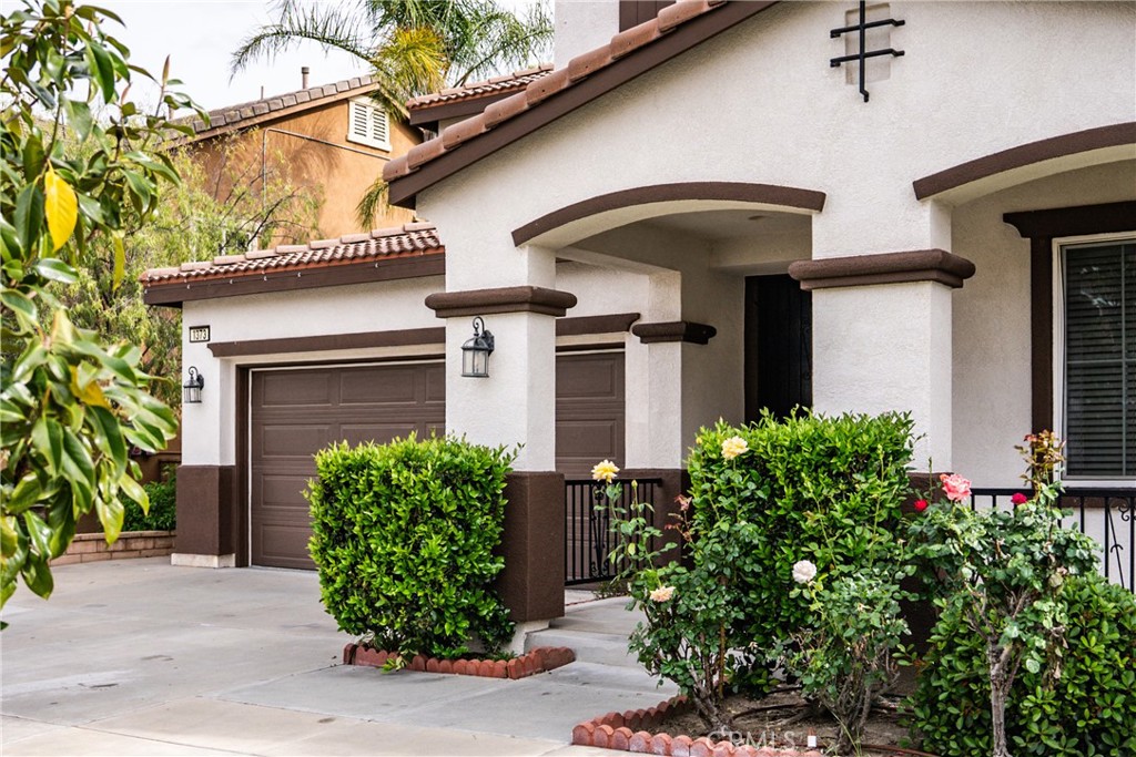1373 Aztec Court Beaumont, CA 92223 - Photo 3 of 56 a front view of house with yard