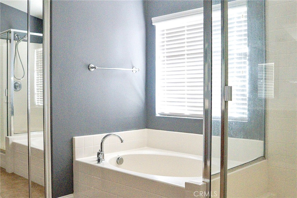 1373 Aztec Court Beaumont, CA 92223 - Photo 35 of 56 a bathroom with bathtub and shower