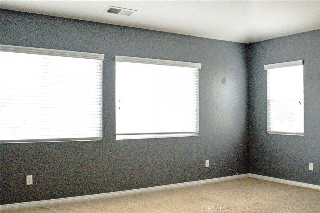 1373 Aztec Court Beaumont, CA 92223 - Photo 37 of 56 a view of an empty room with a window