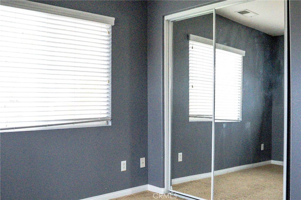 1373 Aztec Court Beaumont, CA 92223 - Photo 39 of 56 a view of an empty room with a window
