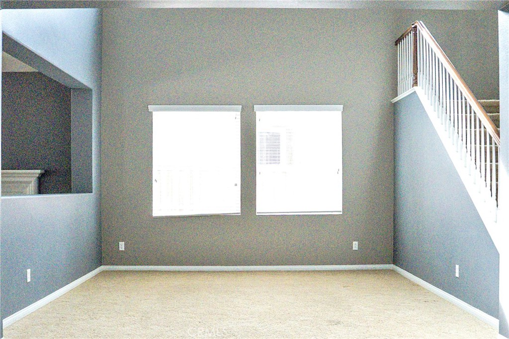1373 Aztec Court Beaumont, CA 92223 - Photo 9 of 56 a view of an empty room and window