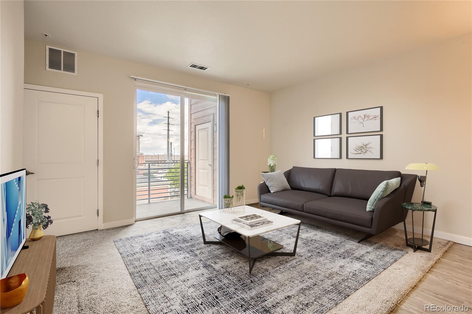 4100 Albion Street, Unit 514 Denver, CO 80216 - Photo 2 of 31 a living room with furniture and a window