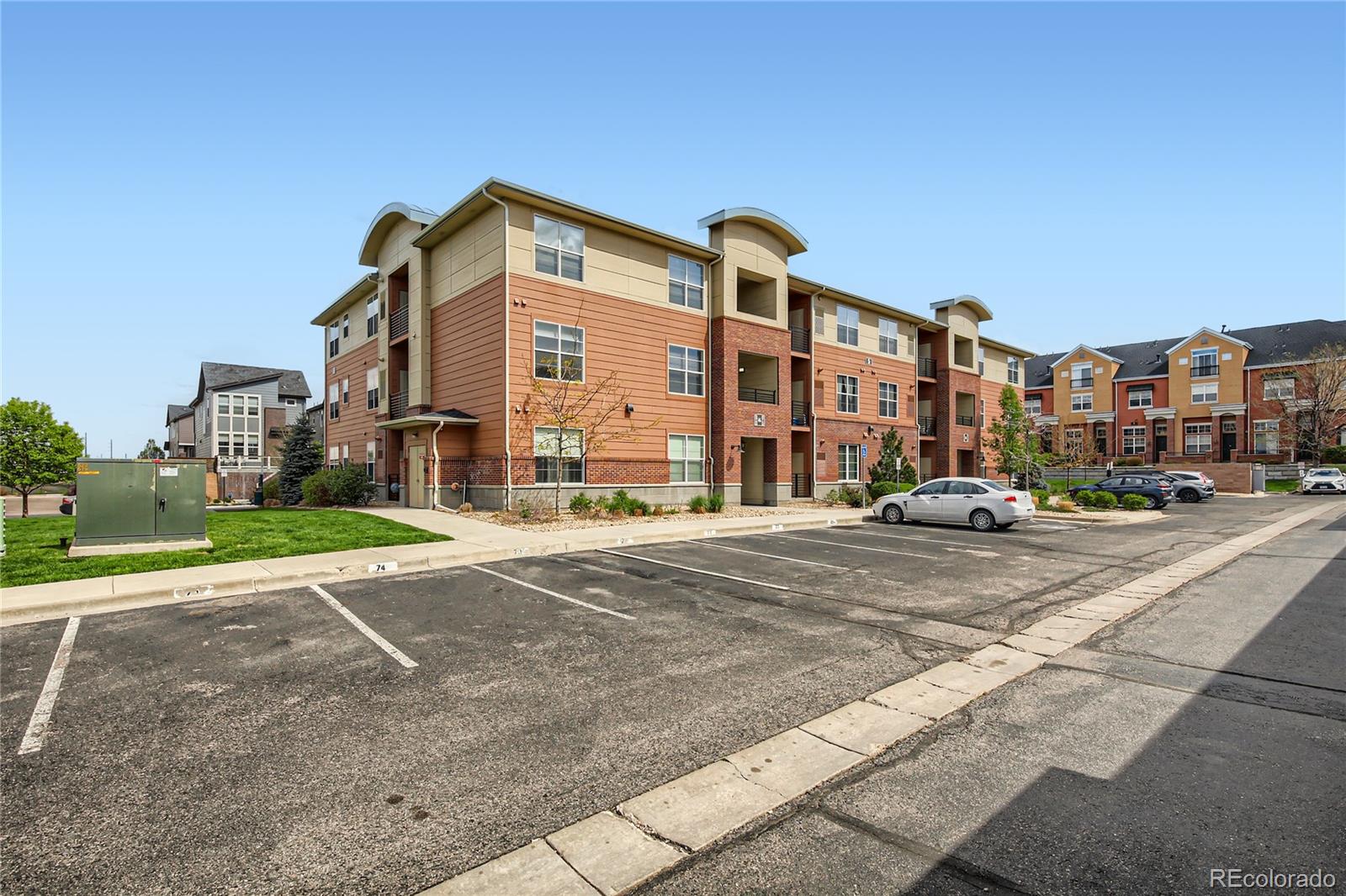 4100 Albion Street, Unit 514 Denver, CO 80216 - Photo 27 of 31 a view of a street with a building in the background
