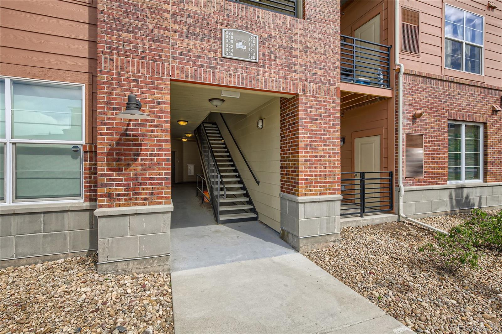 4100 Albion Street, Unit 514 Denver, CO 80216 - Photo 29 of 31 a view of a wooden house with a large window