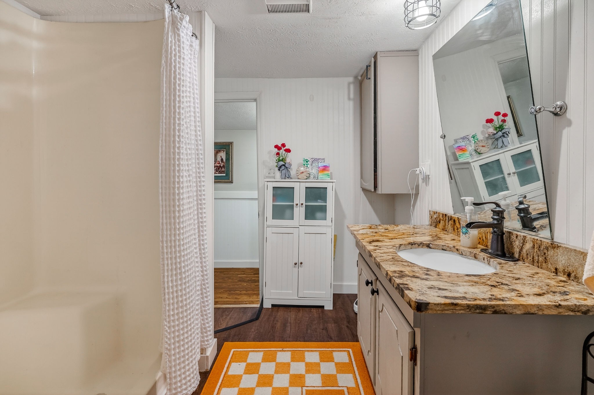 1603 Coon Hunt Road Baxter, TN 38544 - Photo 25 of 51 a kitchen with granite countertop a sink stove and cabinets