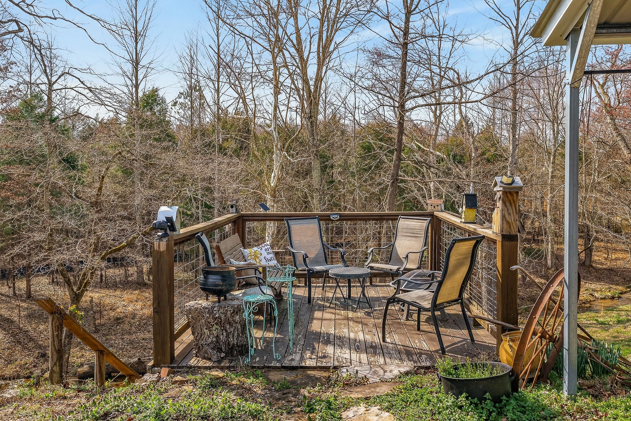 1603 Coon Hunt Road Baxter, TN 38544 - Photo 37 of 51 a view of a balcony with chairs and wooden fence
