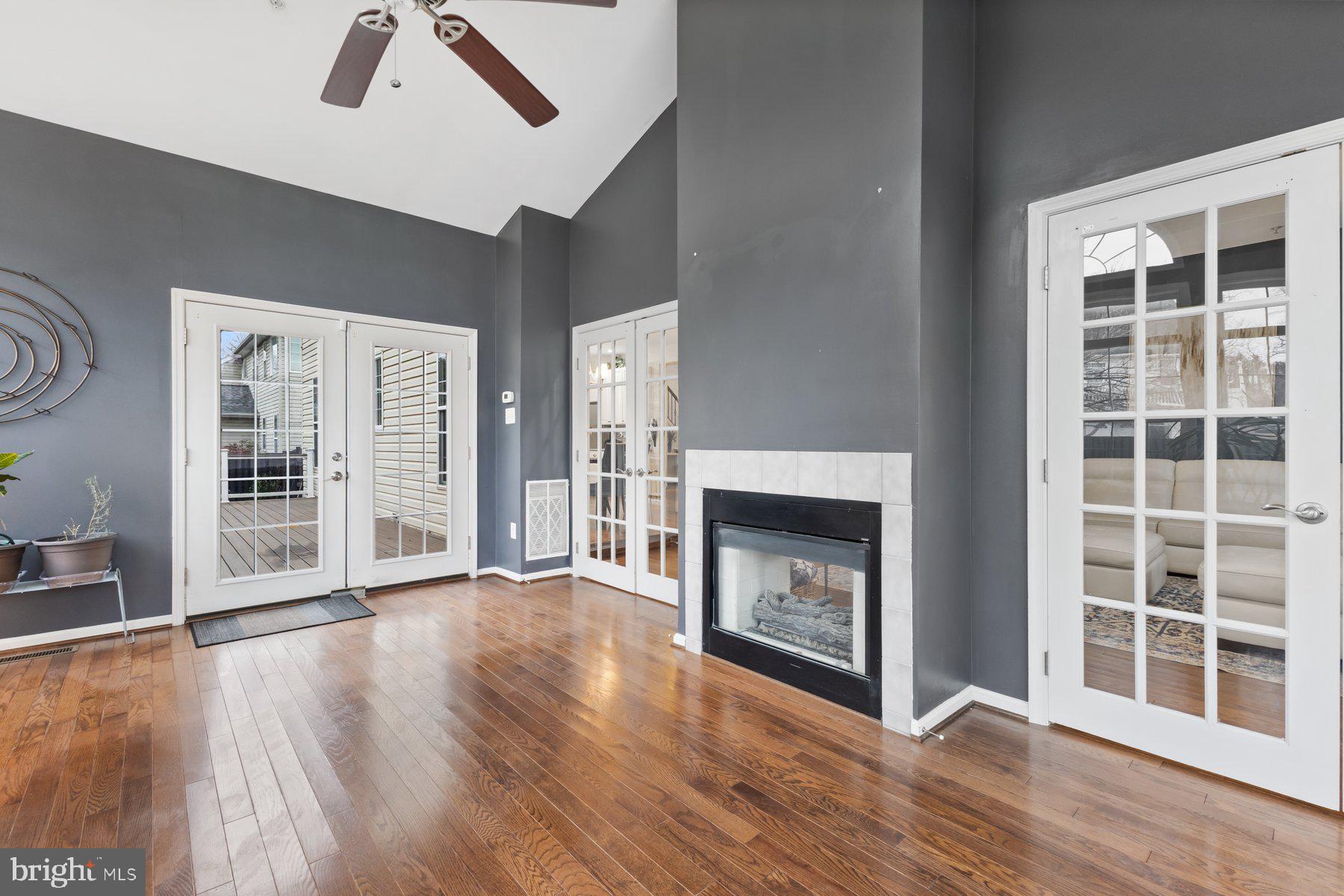 12003 Manchester Way Bowie, MD 20720 - Photo 25 of 49 a view of an empty room with window and fire place