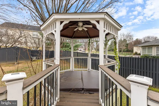 a view of a balcony with furniture