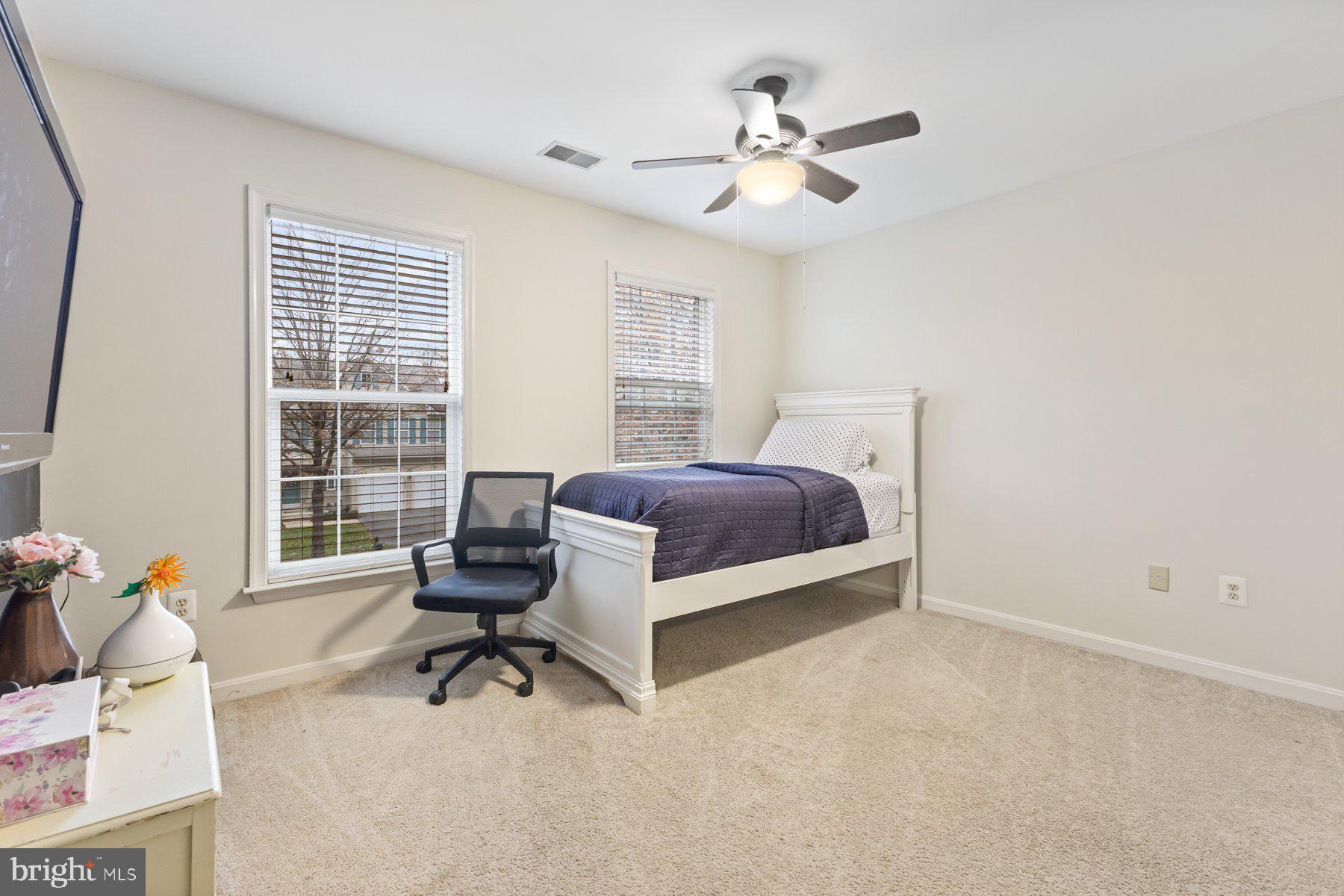 12003 Manchester Way Bowie, MD 20720 - Photo 42 of 49 a bedroom with a bed and a window