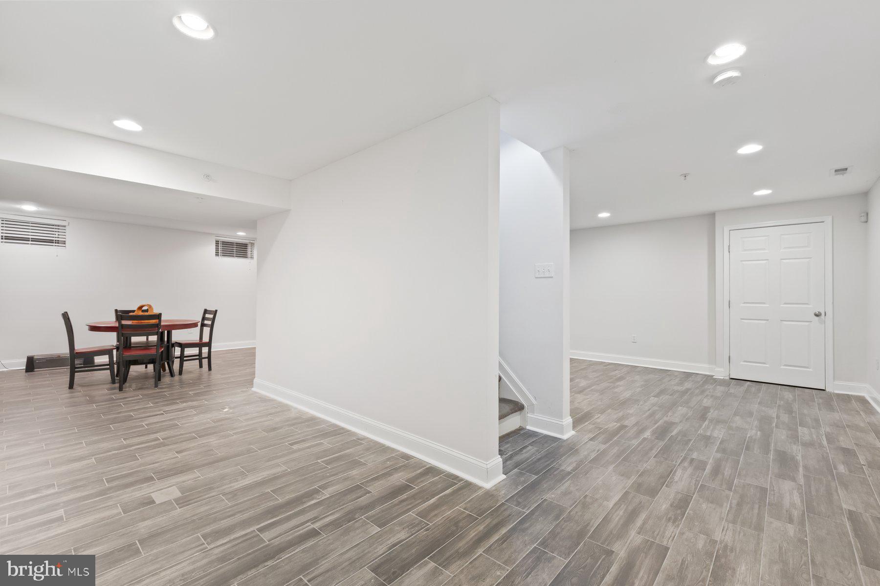 12003 Manchester Way Bowie, MD 20720 - Photo 43 of 49 a view of work space with wooden floor and furniture