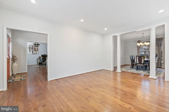 a view of a livingroom with wooden floor