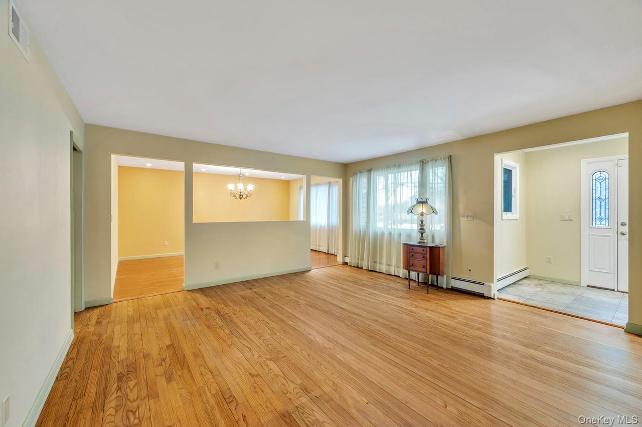 105 Browns Road Nesconset, NY 11767 - Photo 14 of 50 a view of an empty room and glass door