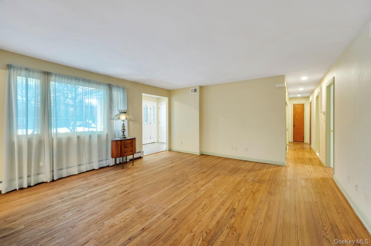 105 Browns Road Nesconset, NY 11767 - Photo 16 of 50 a view of an empty room with glass door