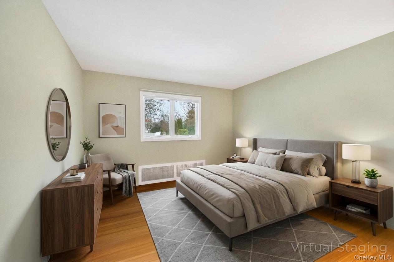 105 Browns Road Nesconset, NY 11767 - Photo 27 of 50 a bedroom with bed and a window